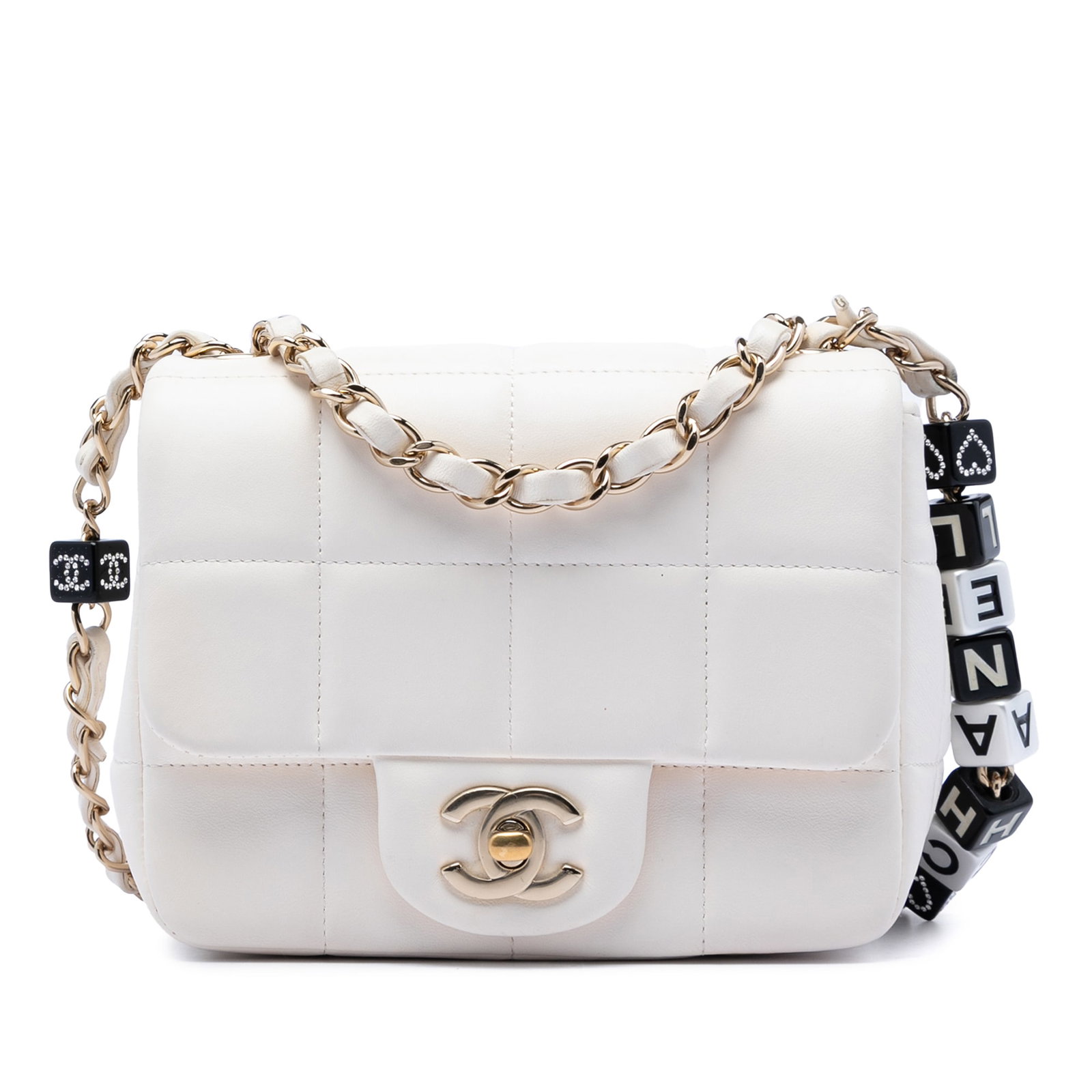 Chanel Monacoco Mini Square Flap Crossbody in White Lambskin: Chanel Monacoco Mini Square Flap Crossbody in White Lambskin Mini Chanel Monacoco flap crossbody bag in white quilted lambskin leather. This bag features a leather-woven chain strap with resin dice de