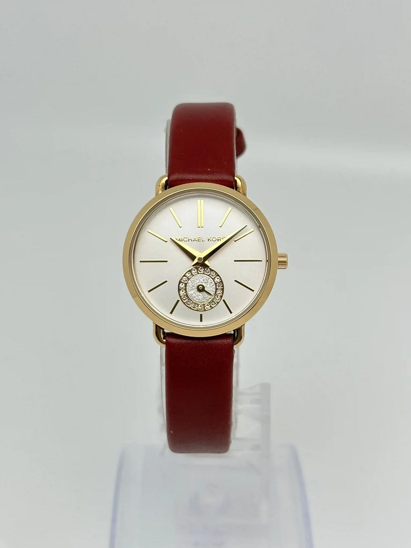 Michael Kors MK2751 Portia ladies quartz watch maroon leather strap: Michael Kors MK2751 Portia ladies quartz watch maroon leather strap Display model Michael Kors Portia ladies quartz watch featuring a maroon leather strap and a white dial with gold-tone hands and ind