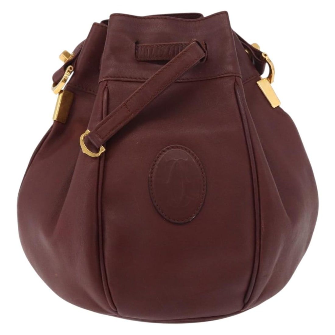 Burgundy Leather Shoulder Bag Cartier Must de cartier: Burgundy Leather Shoulder Bag Cartier Must de cartier Cartier Must de Cartier leather bag in burgundy. Made in Spain, this piece is presented in good condition with visible wear from use, including sh
