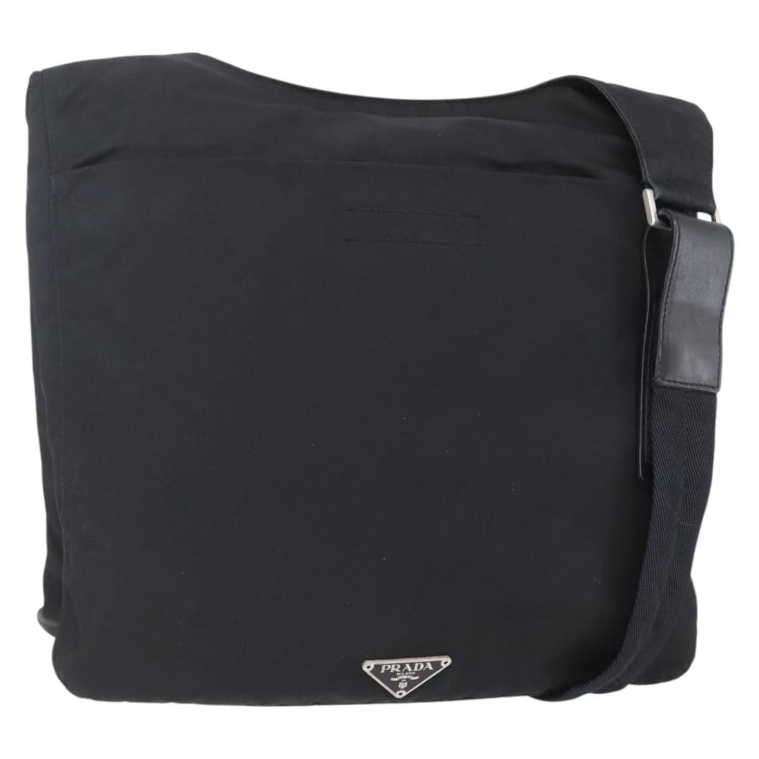 Prada Black Quilted Tessuto Nylon Zip Messenger Bag: Prada Black Quilted Tessuto Nylon Zip Messenger Bag This Prada Zip Messenger bag features a quilted nylon exterior in black, designed for women. The bag is a pre-owned item from Italy and shows signs 