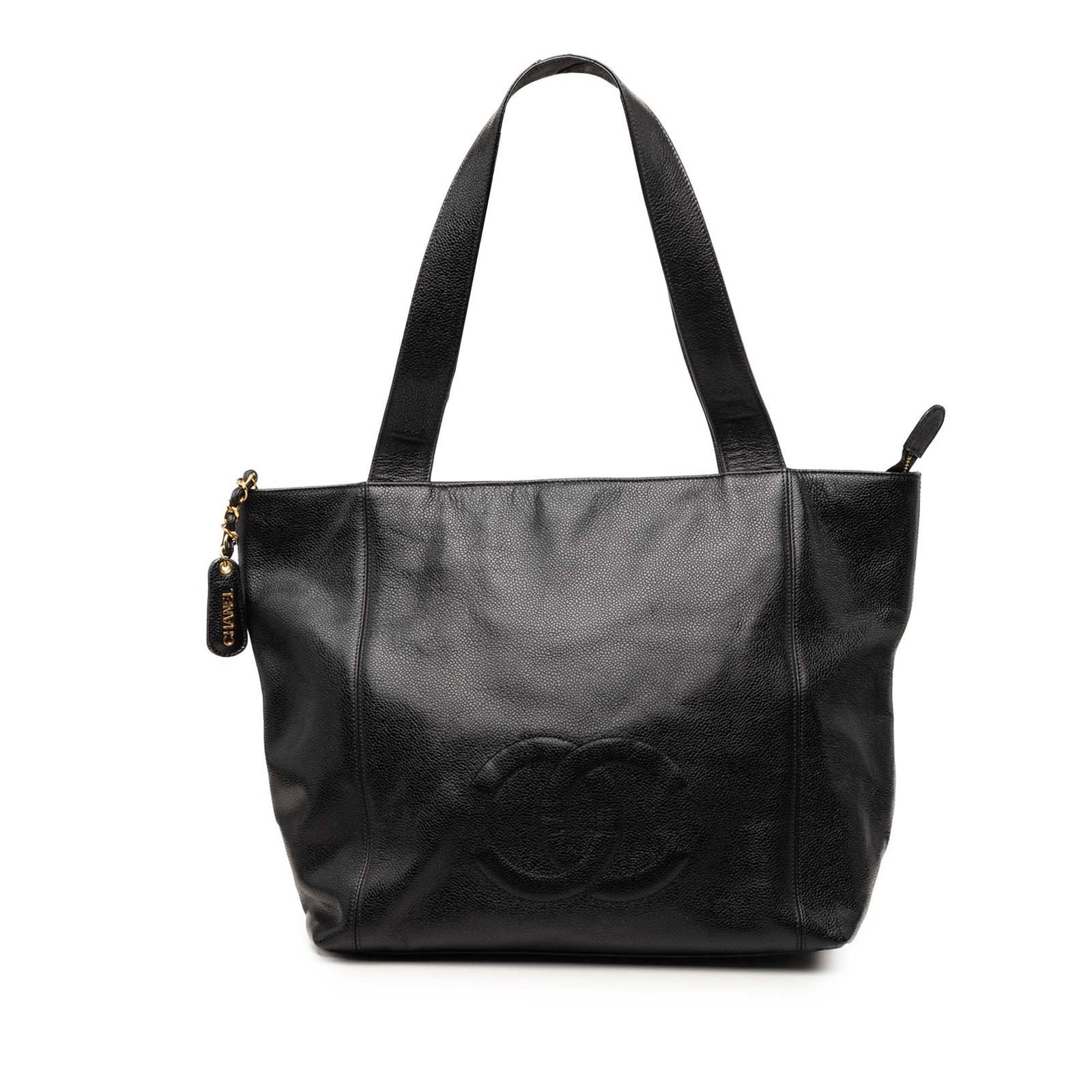 Chanel CC Caviar Leather Tote Bag Black: Chanel CC Caviar Leather Tote Bag Black Chanel CC Caviar Tote in black leather with flat leather straps, a top zip closure, and an interior zip pocket. Made in Italy. Condition B+ with visible wear an