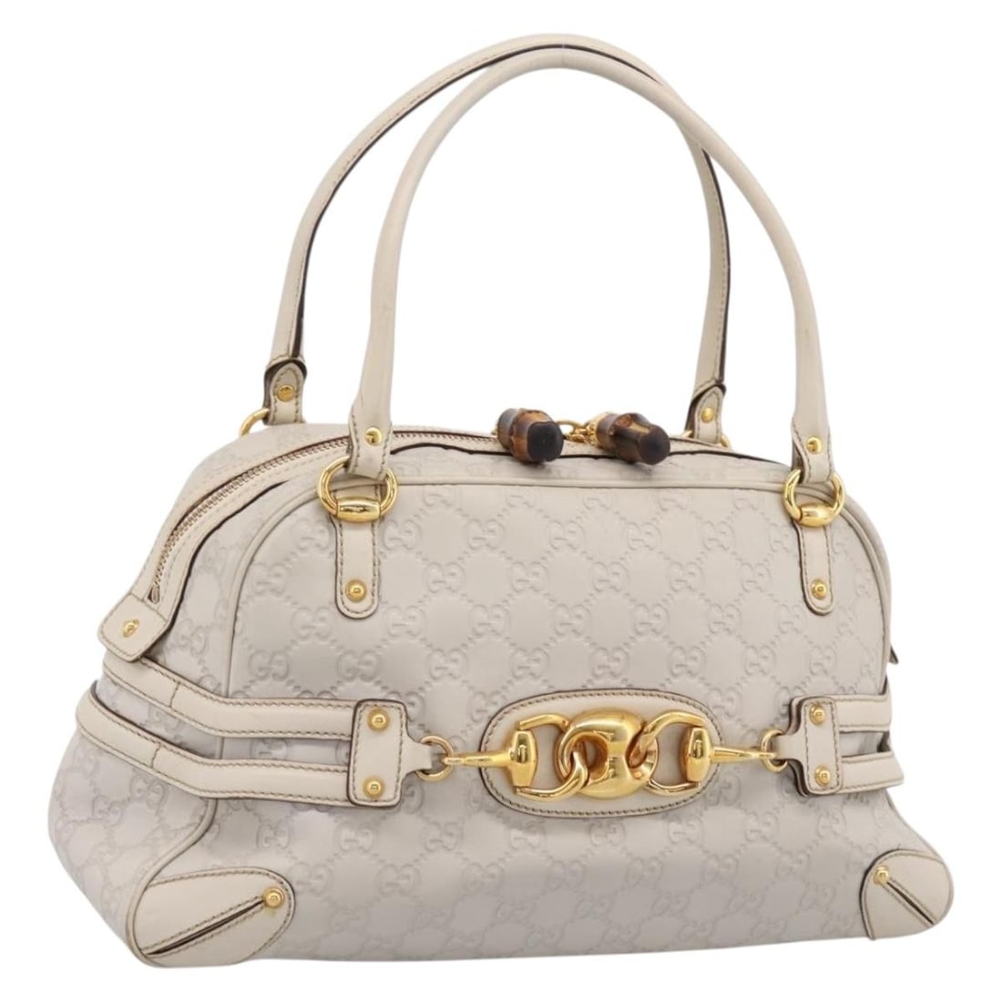 Gucci 159398 Ivory GG Canvas and Leather Boston Bag: Gucci 159398 Ivory GG Canvas and Leather Boston Bag Gucci Boston bag in ivory leather and GG canvas with horsebit and bamboo design details. Includes a dust bag. Made in Italy. Condition is B with rea