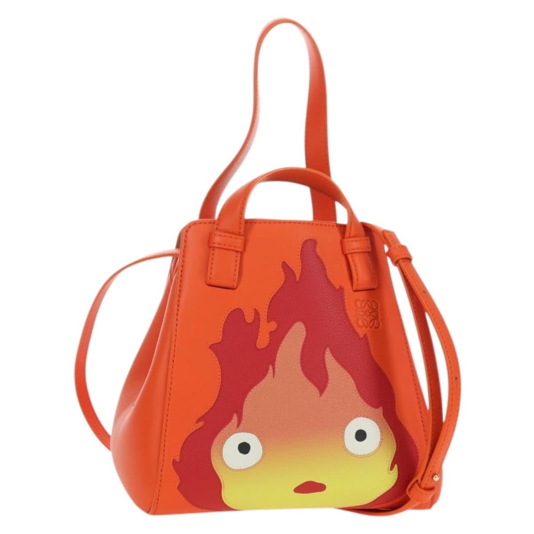 LOEWE Studio Ghibli Calcifer Nugget Hammock Leather Handbag Orange: LOEWE Studio Ghibli Calcifer Nugget Hammock Leather Handbag Orange LOEWE x Studio Ghibli Calcifer Nugget Hammock handbag in orange leather. This women's bag includes a shoulder strap and dust bag. It 