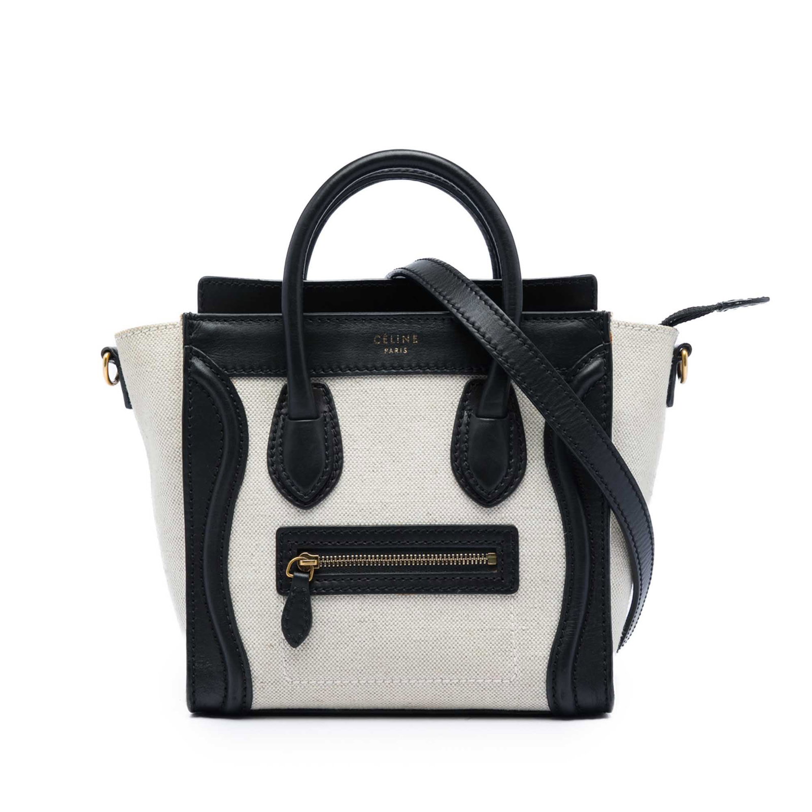 Celine Nano Luggage Tote in Bicolor Canvas and Leather: Celine Nano Luggage Tote in Bicolor Canvas and Leather Celine Nano Bicolor Luggage Tote crafted with a canvas and leather body. This handbag features rolled leather handles, a detachable flat shoulder