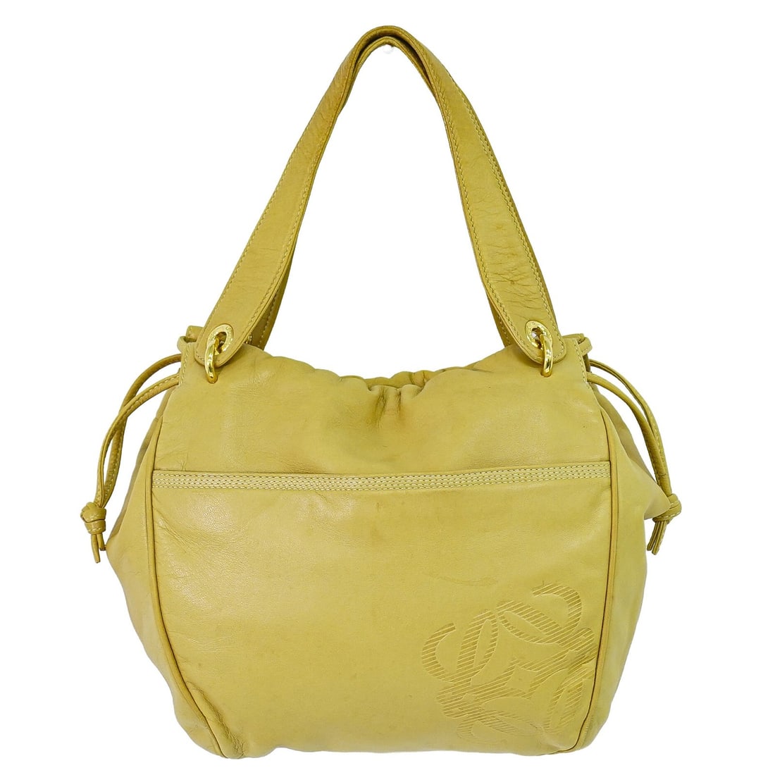 Loewe Anagram leather tote bag beige 18cm x 23cm x 7cm: Loewe Anagram leather tote bag beige 18cm x 23cm x 7cm This Loewe Anagram Tote is crafted from beige leather and designed for unisex use. Made in Spain, the tote features the brand's signature style a