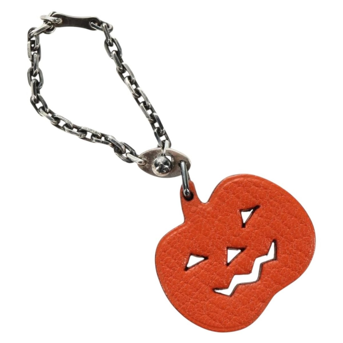 Hermes Leather Pumpkin Bag Charm in Orange: Hermes Leather Pumpkin Bag Charm in Orange A Hermes leather bag charm in orange, made in France. It is described as a women's accessory and is in excellent condition, with no remarkable scratches, and