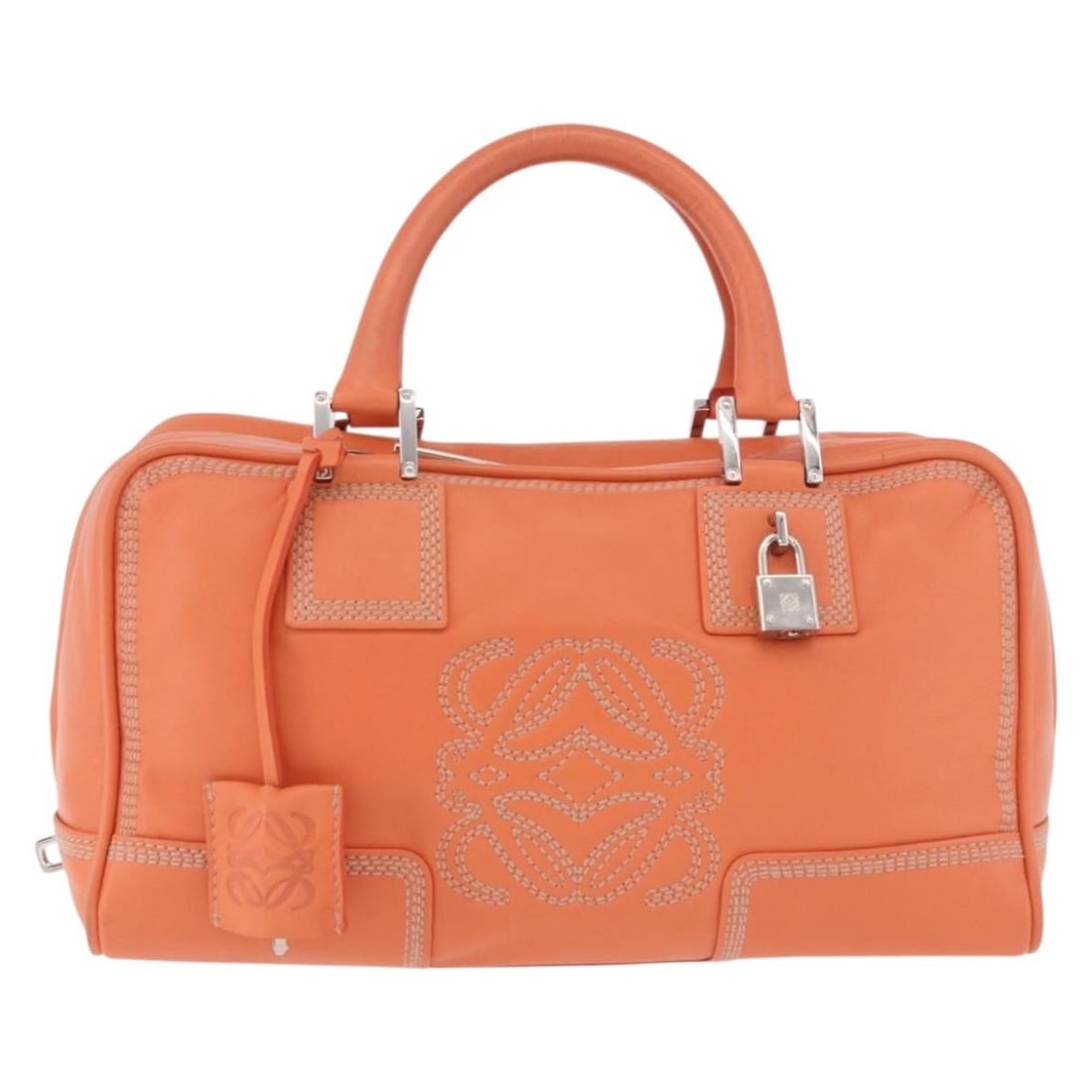 Loewe Anagram orange leather handbag: Loewe Anagram orange leather handbag Loewe Anagram leather bag in orange. This piece is made in Spain and is presented in good condition with visible wear, including some loss of shape to the exterior