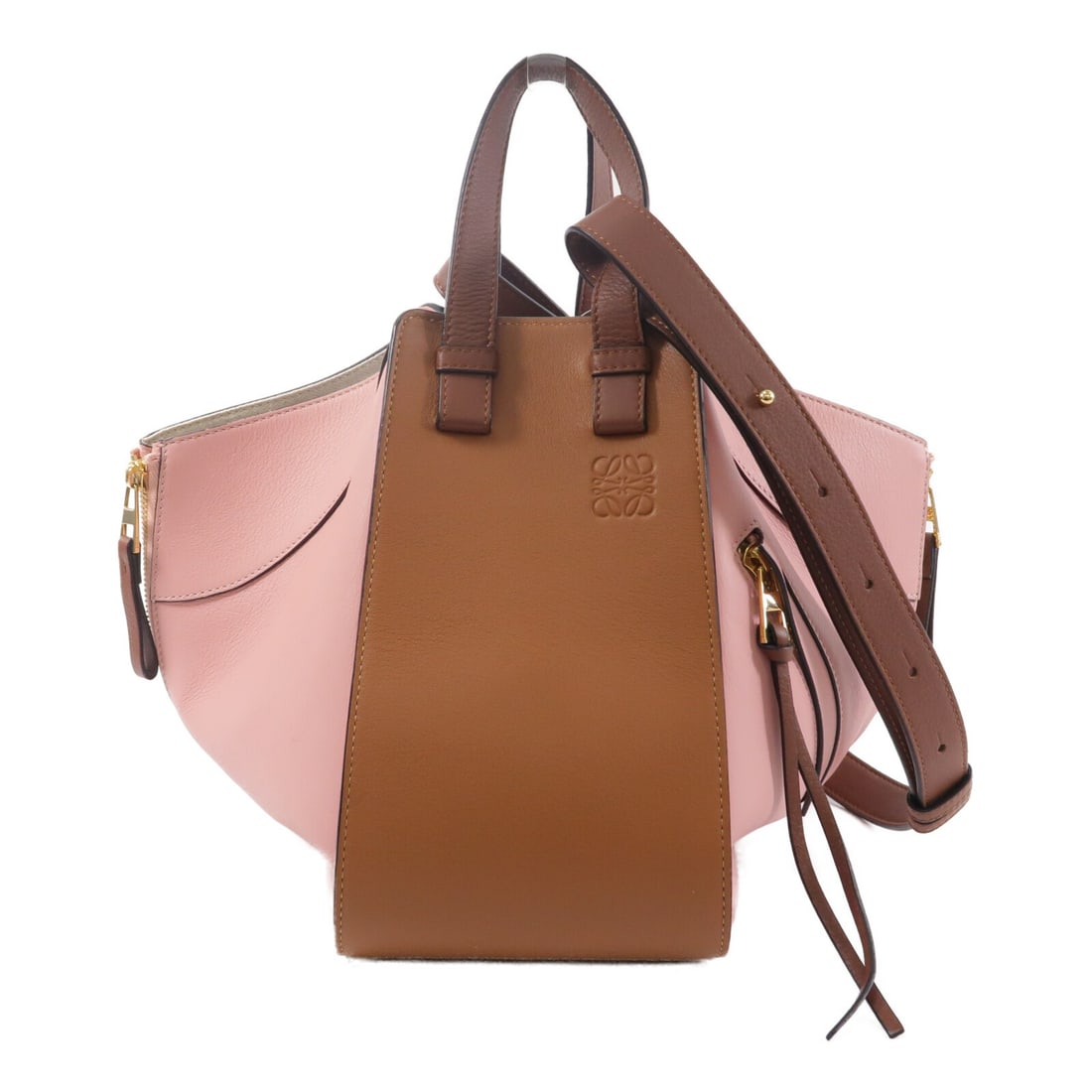LOEWE Hammock Small 2 Way Shoulder Bag Pink Calfskin GHW: LOEWE Hammock Small 2 Way Shoulder Bag Pink Calfskin GHW Small LOEWE Hammock 2-way shoulder bag in pink calfskin leather. This women's bag features an open exterior pocket design and an interior zip p