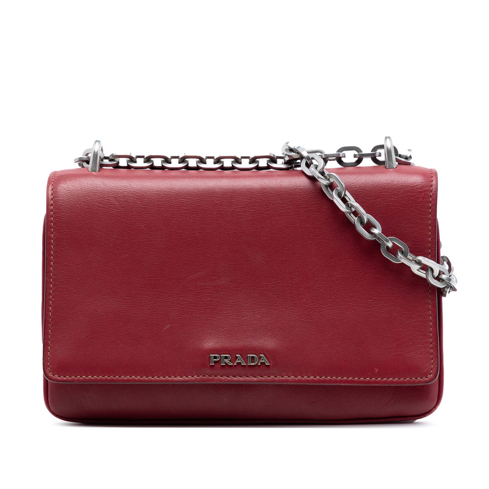 Prada Soft Calf leather chain crossbody bag: Prada Soft Calf leather chain crossbody bag This Prada Soft Calf Chain Crossbody bag is crafted from red leather and features a curb chain link strap with a leather guard, a front flap with magnetic s