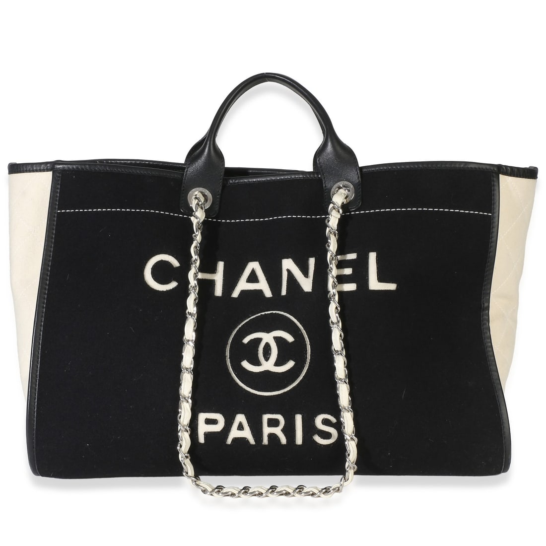 Chanel Deauville Large Tote Black White Fabric with Dustbag: Chanel Deauville Large Tote Black White Fabric with Dustbag Pre-owned Chanel Deauville tote in black and white fabric with calfskin and felt detailing. This large unisex bag features a magnetic snap c