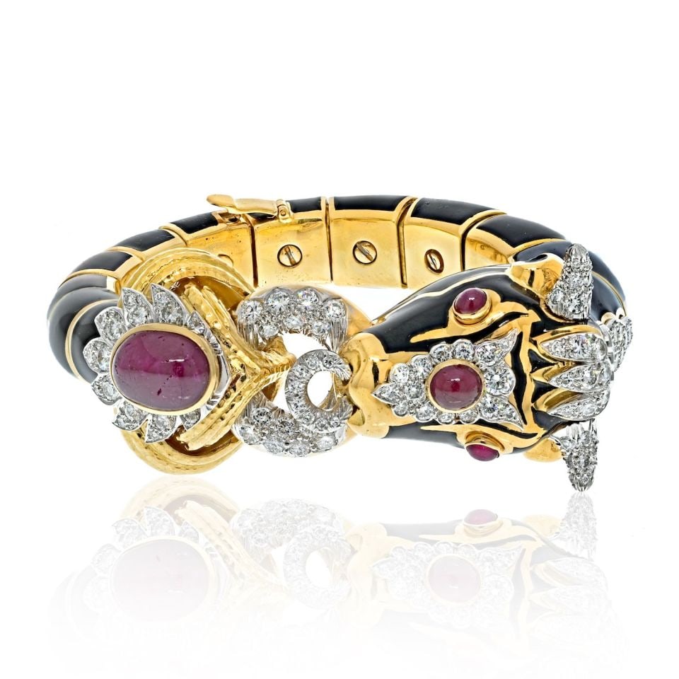 David Webb Platinum 18K Yellow Gold Bull Bracelet with Black Enamel Ruby Diamond: David Webb Platinum 18K Yellow Gold Bull Bracelet with Black Enamel Ruby Diamond Introducing the David Webb Platinum & 18K Yellow Gold Black Enamel Red Ruby Diamond Bull Bracelet, a stunning embodimen