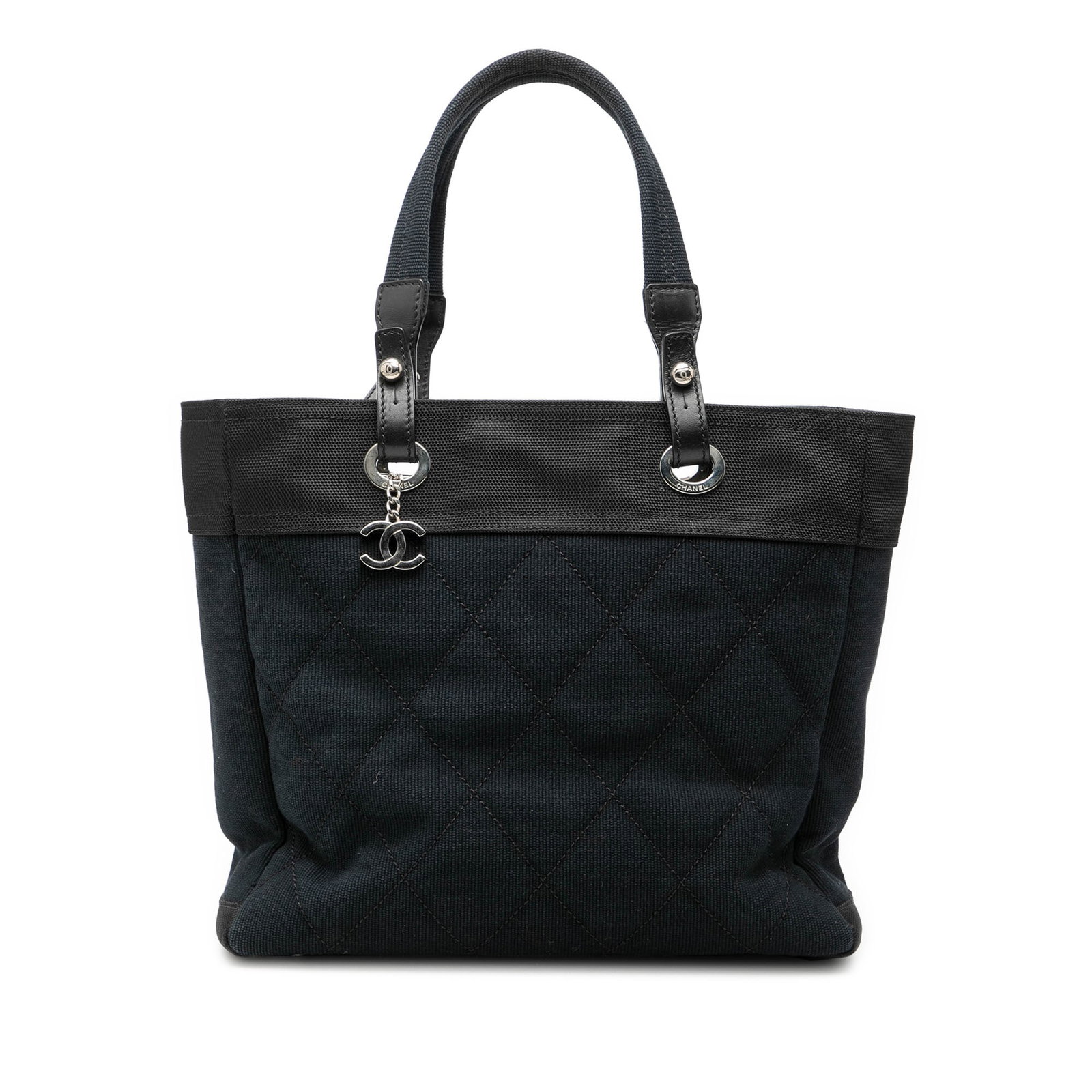 Blue Paris Biarritz Medium Tote Quilted Canvas by Chanel: Blue Paris Biarritz Medium Tote Quilted Canvas by Chanel This Chanel Medium Quilted Canvas Paris Biarritz Tote features a quilted canvas body in blue, flat handles, a top zip closure, and both interio