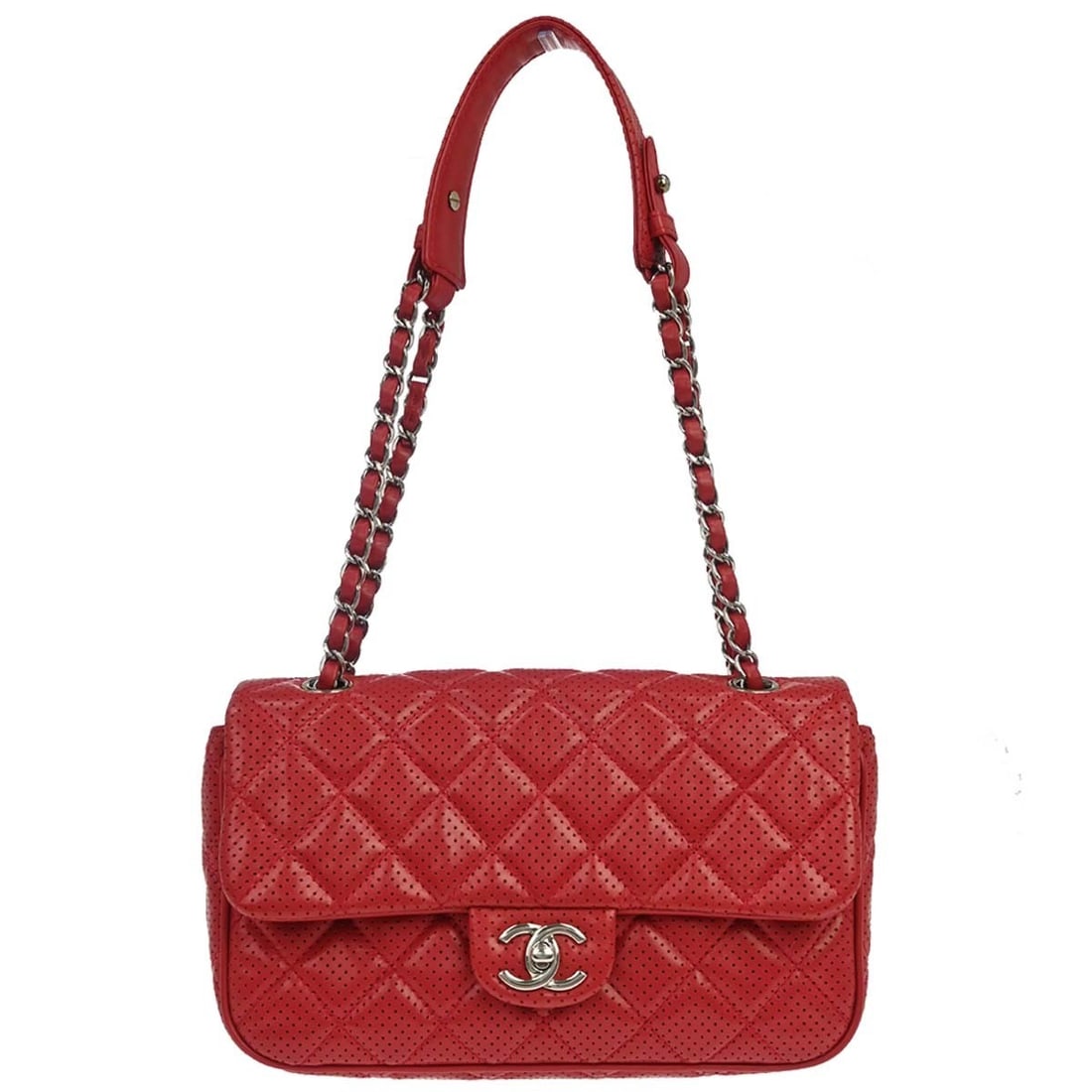 CHANEL perforated lambskin top handle bag in red: CHANEL perforated lambskin top handle bag in red Chanel red perforated lambskin handbag in a top handle bag style, made in France. It features a zip closure, leather lining, inner pockets, and logo ac