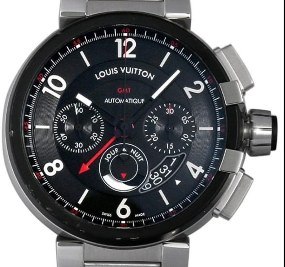 Louis Vuitton Q1052 Tambour GMT Chronograph watch with papers: Louis Vuitton Q1052 Tambour GMT Chronograph watch with papers Louis Vuitton Tambour Chronograph GMT wristwatch featuring a black dial, smooth bezel, and stainless steel bracelet. This men's watch is i