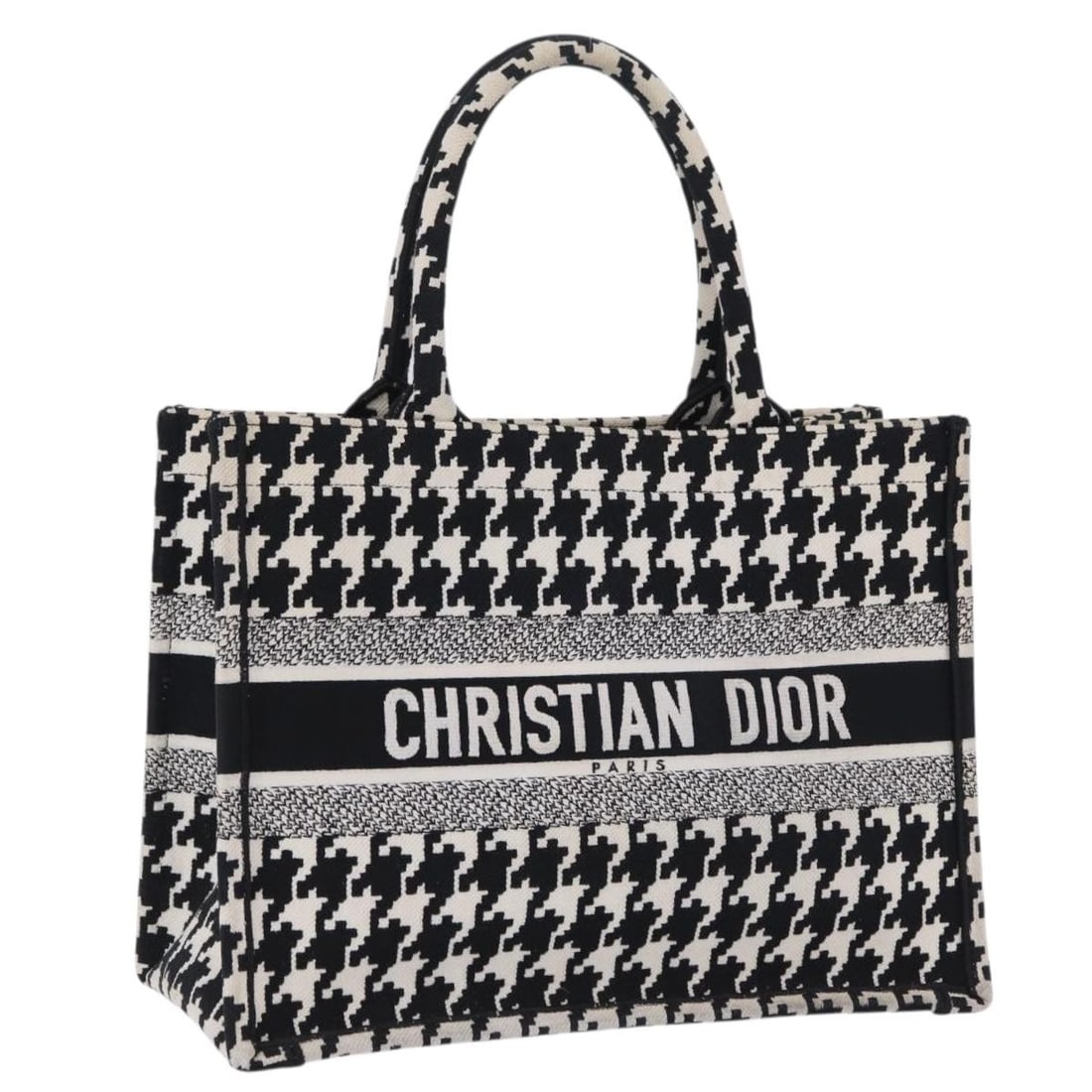 Christian Dior Book Tote Medium Canvas Bag Black White: Christian Dior Book Tote Medium Canvas Bag Black White Medium Christian Dior Book Tote in black and white canvas with a staggered pattern. Made in Italy, this women's tote features an open, structured
