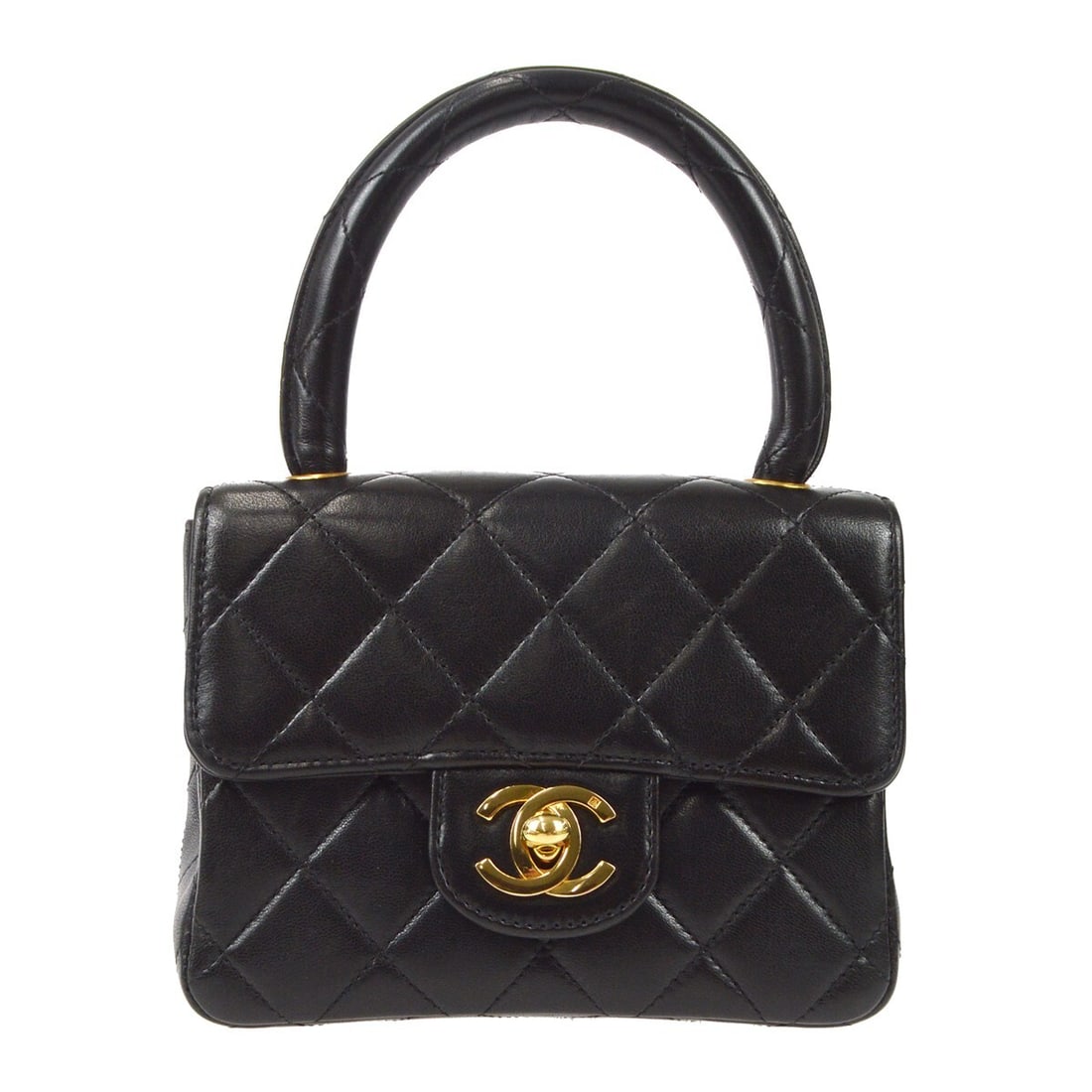 Chanel Mini Square Top Handle Bag in Black Quilted Lambskin: Chanel Mini Square Top Handle Bag in Black Quilted Lambskin Compact Chanel Micro Classic Flap handbag in black lambskin leather with a quilted matelasse design and CC turn-lock flap closure. This wome