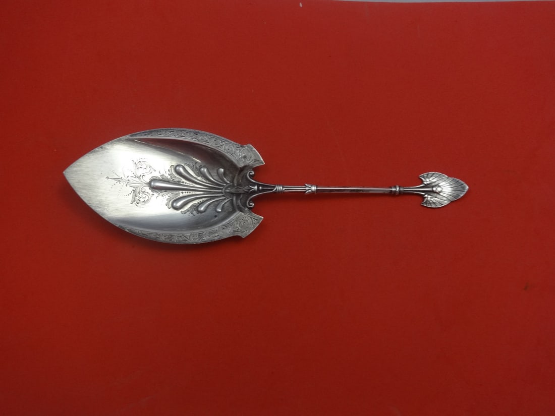 Gorham Lotus Sterling Silver Brite-Cut Pie Server 10.5": Gorham Lotus Sterling Silver Brite-Cut Pie Server 10.5" This exquisite pie server features a flat handle design and is crafted from high-quality sterling silver. Designed in the Lotus pattern by Gorha