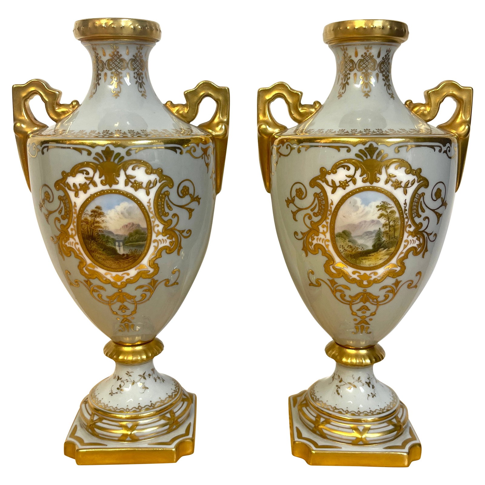Set of 2 19th Century Coalport Scenic Porcelain Vases: Set of 2 19th Century Coalport Scenic Porcelain Vases This exquisite pair of 19th century Coalport scenic cabinet vases embodies the elegance of the High Victorian style. Each vase features a striking
