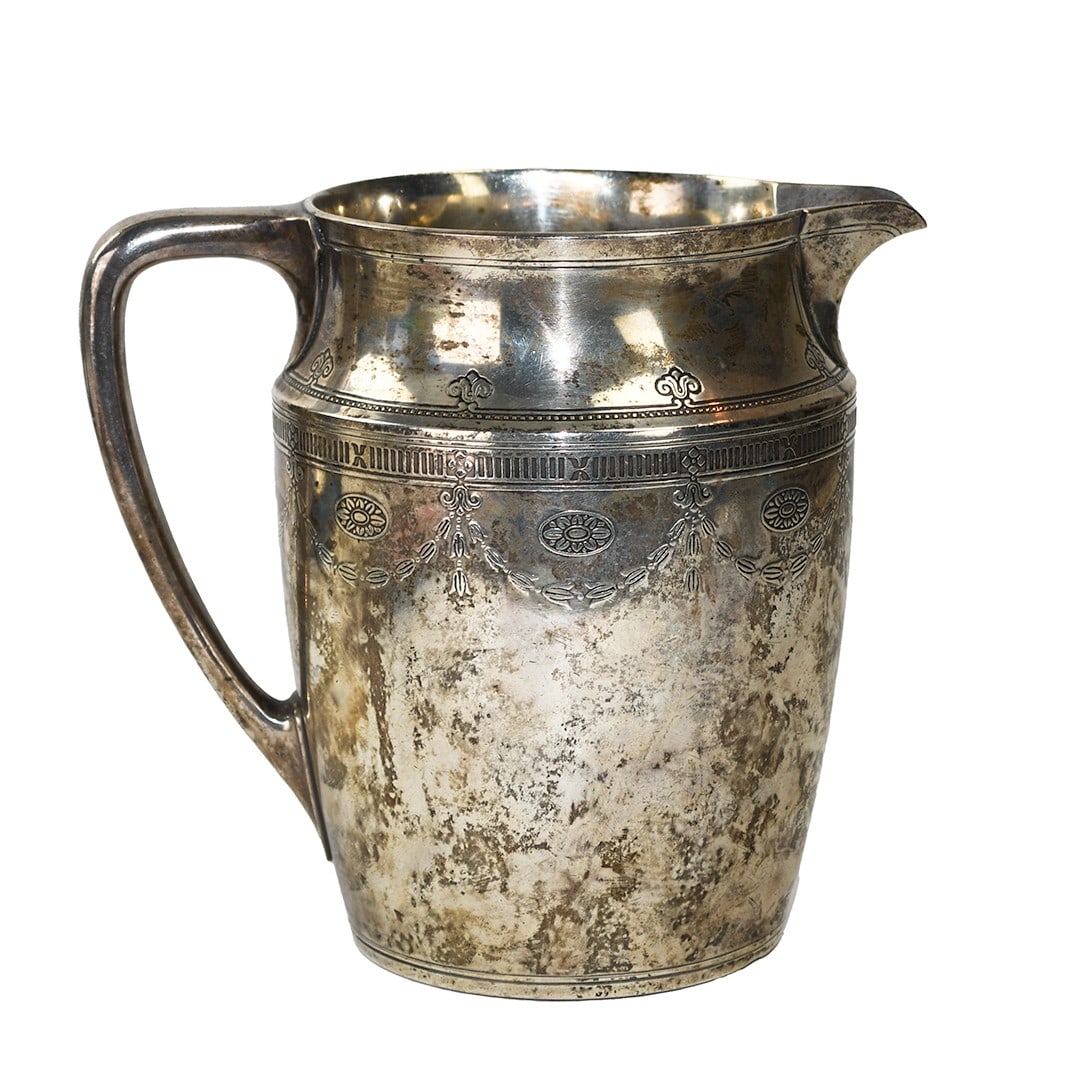 Tiffany & Co. Sterling Silver Pitcher 26.85 oz: Tiffany & Co. Sterling Silver Pitcher 26.85 oz This is a Tiffany & Co. sterling silver pitcher, crafted in the United States. The pitcher is marked "TIFFANY & CO." and weighs 26.85 ounces. It is in pr