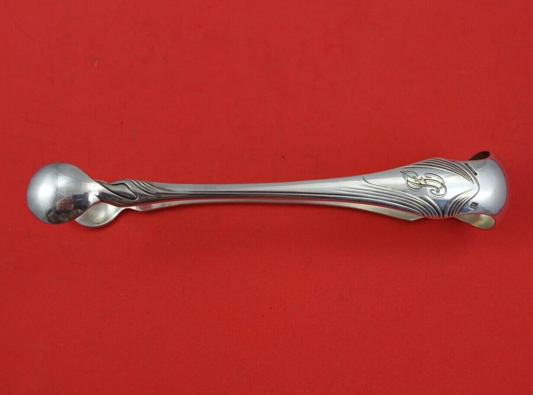 Christofle Moderne Gramont Silverplate Ice Tong 6 1/4 inches Monogrammed: Christofle Moderne Gramont Silverplate Ice Tong 6 1/4 inches Monogrammed This exquisite silverplate ice tong is a part of the Moderne Gramont pattern by Christofle, crafted between 1900 and 1940. Meas