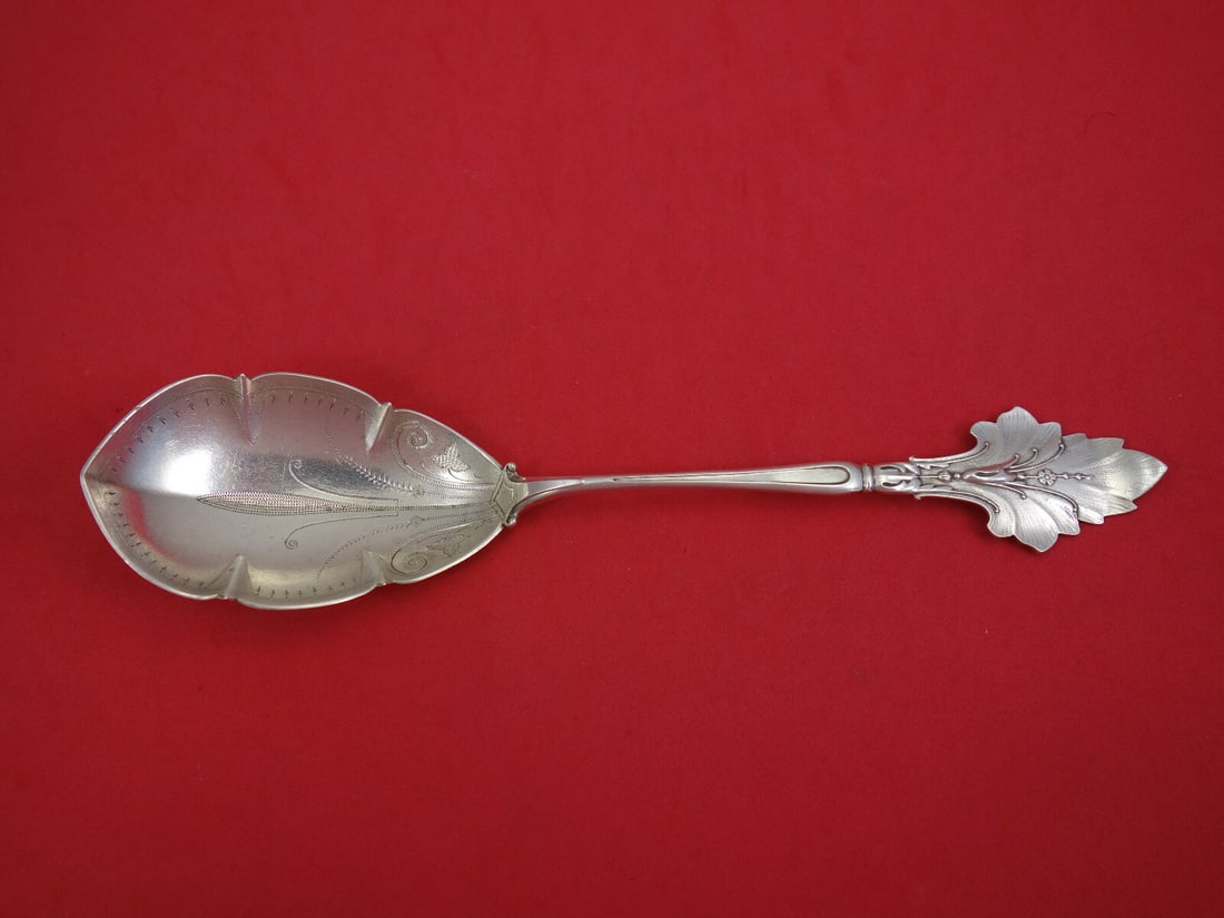 Wood & Hughes Sterling Silver Berry Spoon with Flower Design 9 1/8 in: Wood & Hughes Sterling Silver Berry Spoon with Flower Design 9 1/8 in This exquisite Wood and Hughes berry spoon is crafted from high-quality sterling silver and features a charming flower design on t