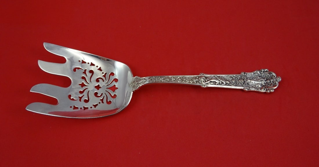 Sterling Silver Asparagus Fork Coligni Pattern Pierced 9 1/8 Inch: Sterling Silver Asparagus Fork Coligni Pattern Pierced 9 1/8 Inch This sterling silver asparagus serving fork is crafted in the Coligni multi-motif pattern by Gorham. Measuring 9 1/8 inches in length,