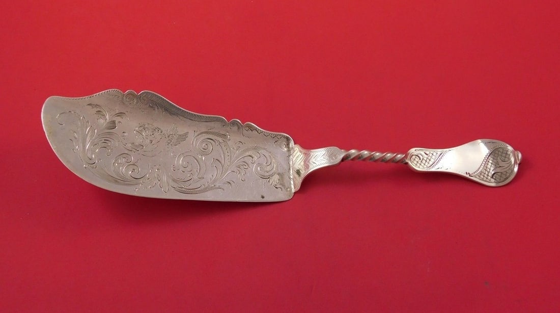 Duhme Twist Sterling Silver Fish Server Merman 10 5/8": Duhme Twist Sterling Silver Fish Server Merman 10 5/8" This exquisite fish server from the Twist pattern by Duhme features a beautifully crafted merman pouring water into waves. Made from high-quality