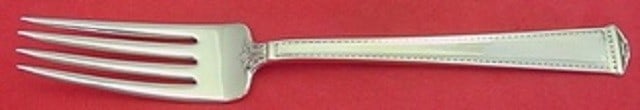 International Sterling Silver Pantheon Dinner Fork 7.75 Inches: International Sterling Silver Pantheon Dinner Fork 7.75 Inches This Pantheon dinner fork by International is a stunning piece of flatware crafted from sterling silver. Measuring 7 3/4 inches, this for