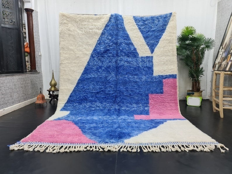 Handmade Moroccan Berber Soft Wool Area Rug 9.84 x 6.56 Feet: Handmade Moroccan Berber Soft Wool Area Rug 9.84 x 6.56 Feet Discover the beauty of this authentic handmade Moroccan Berber soft area wool rug, crafted in the heart of the Atlas Mountains. This exquis