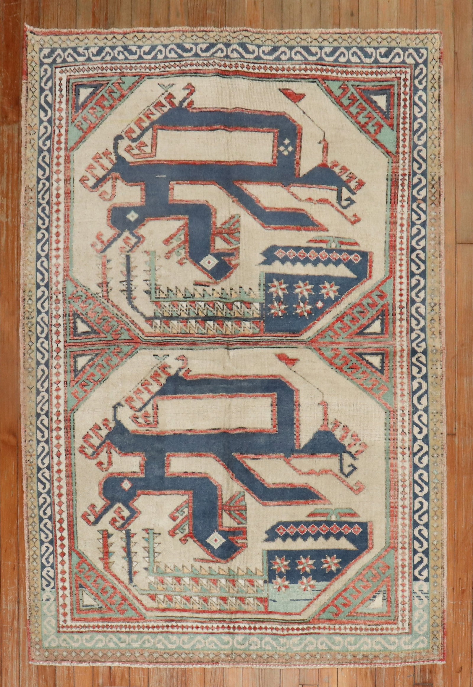 4' 3" x 6' Mid 20th Century Turkish Pictorial Accent Rug: 4' 3" x 6' Mid 20th Century Turkish Pictorial Accent Rug Mid 20th century Turkish Anatolian pictorial rug featuring two slithering snakes on an ivory field. This pre-owned accent rug presents a distin