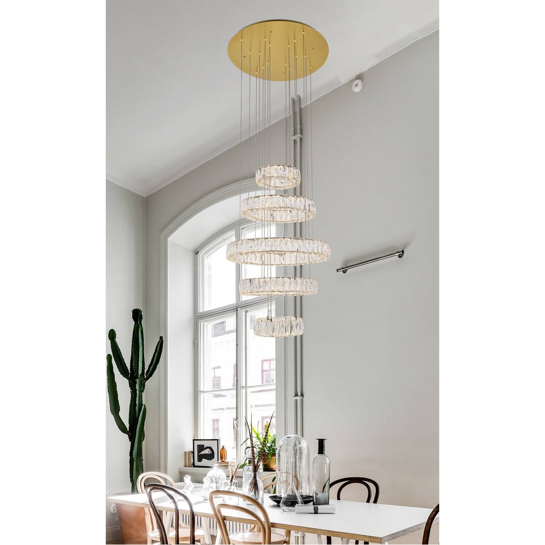 Monroe Gold Crystal LED Chandelier 25.6 inch Round Fixture: Monroe Gold Crystal LED Chandelier 25.6 inch Round Fixture This modern crystal chandelier features a sleek gold-finished stainless steel frame adorned with royal-cut clear crystals, creating a strikin