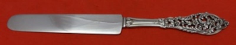 Dominick and Haff Trianon Pierced Sterling Silver Flat Handle Knife 8": Dominick and Haff Trianon Pierced Sterling Silver Flat Handle Knife 8" Sterling silver regular knife in the Trianon Pierced pattern by Dominick & Haff. It features a flat handle, is not monogrammed, a