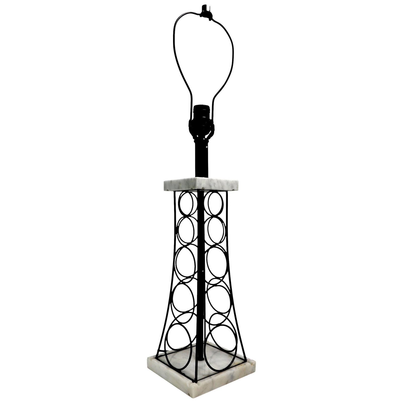 Midcentury Wrought Iron Marble Table Lamp Eiffel Tower Design: Midcentury Wrought Iron Marble Table Lamp Eiffel Tower Design This midcentury table lamp boasts a striking design that evokes the iconic Eiffel Tower or an oil derrick. Crafted from wrought iron and m