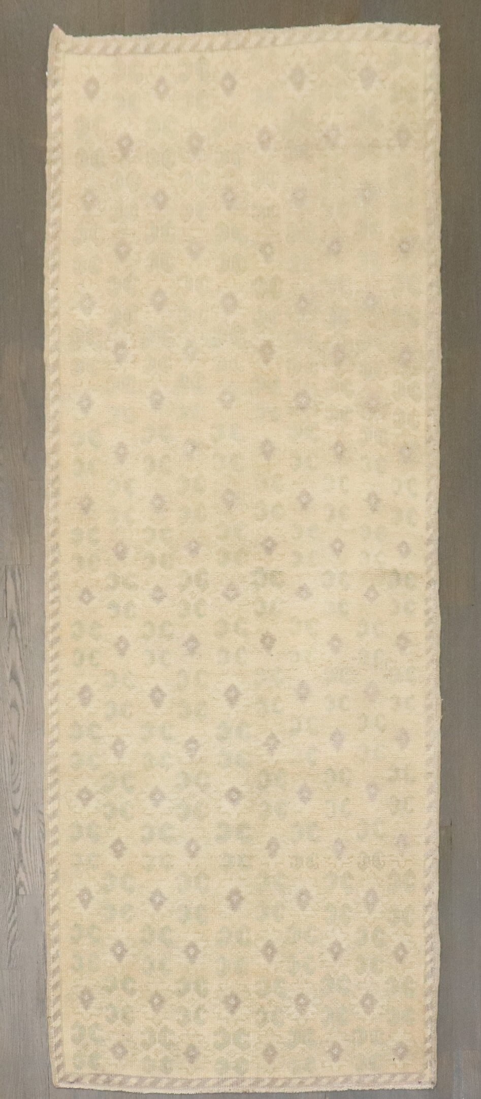 2' 11" x 7' 1" Turkish Oushak Konya Rug Runner: 2' 11" x 7' 1" Turkish Oushak Konya Rug Runner Vintage Turkish Konya runner in a neutral tone palette, dating to the mid-20th century. This pre-owned runner is identified as a Konya and Oushak type. S