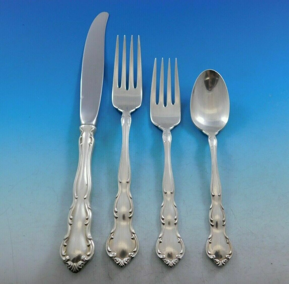 Wallace My Love Sterling Silver 4-Piece Place Setting: Wallace My Love Sterling Silver 4-Piece Place Setting Enhance your dining experience with this exquisite 4-piece place setting in the "My Love" pattern by Wallace. Crafted from high-quality sterling s