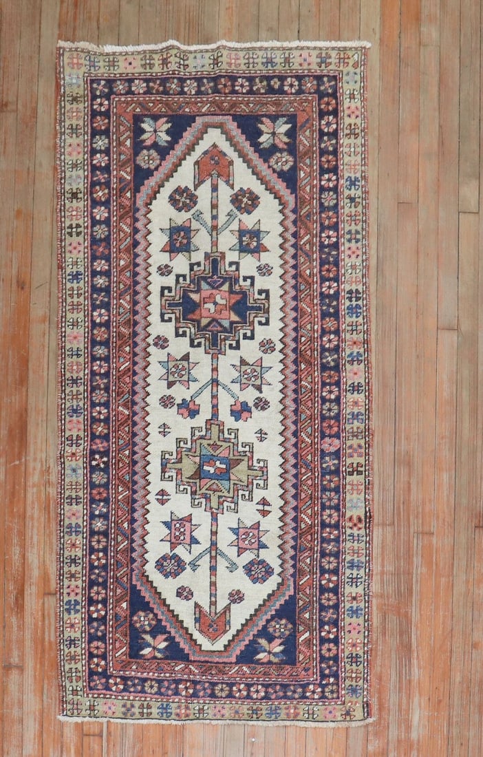 2' 11" x 5' 11" Persian Heriz Runner Ivory Ground: 2' 11" x 5' 11" Persian Heriz Runner Ivory Ground Antique Ivory Heriz runner rug with an ivory ground and a distinctive design. This Persian Serapi/Heriz piece is noted as highly decorative and rare. 
