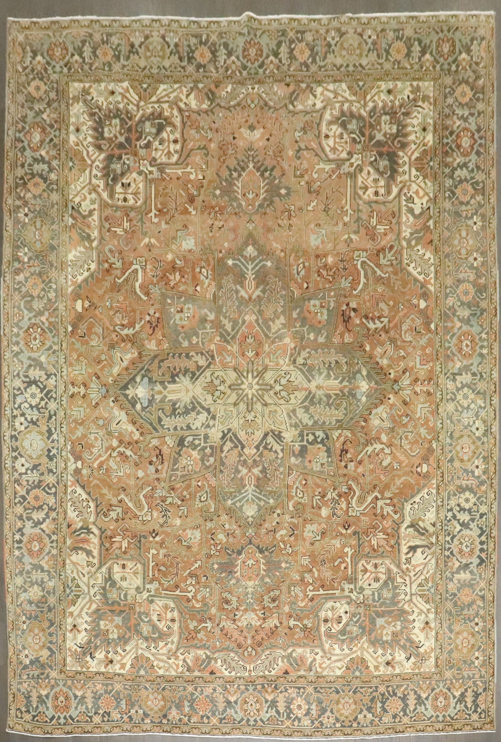 10' x 13' 8" Persian Heriz Room Rug in Brown and Cream: 10' x 13' 8" Persian Heriz Room Rug in Brown and Cream A neutral-colored Persian Heriz rug from the mid-20th century, featuring soft brown and cream tones in a large room-size format. Classified as a 
