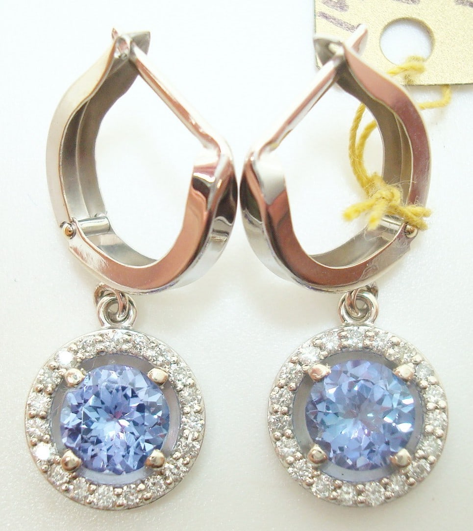 Stunning 14k White Gold Dangle Earrings with 1.80ct Tanzanite and Diamonds: Stunning 14k White Gold Dangle Earrings with 1.80ct Tanzanite and Diamonds Discover these exquisite 14k white gold earrings featuring genuine natural tanzanite and sparkling diamonds. Each earring sho
