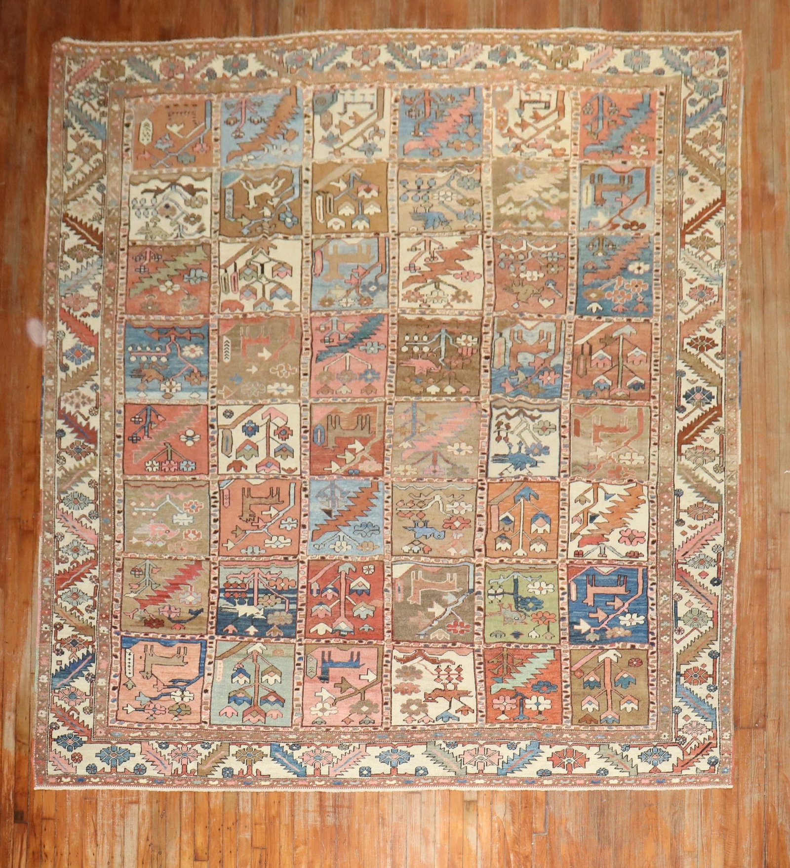 9' 10" x 12' 7" Persian Heriz Pictorial Room Rug: 9' 10" x 12' 7" Persian Heriz Pictorial Room Rug Early 20th century Persian Heriz rug featuring a pictorial garden box all-over pattern in rustic brown, camel, ivory, pink, and green accent colors. Pr