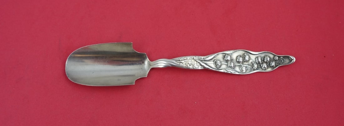 Whiting Lily of the Valley Sterling Silver Cheese Scoop 7": Whiting Lily of the Valley Sterling Silver Cheese Scoop 7" This exquisite cheese scoop features the classic Lily of the Valley pattern by Whiting, crafted from high-quality sterling silver. Patented i