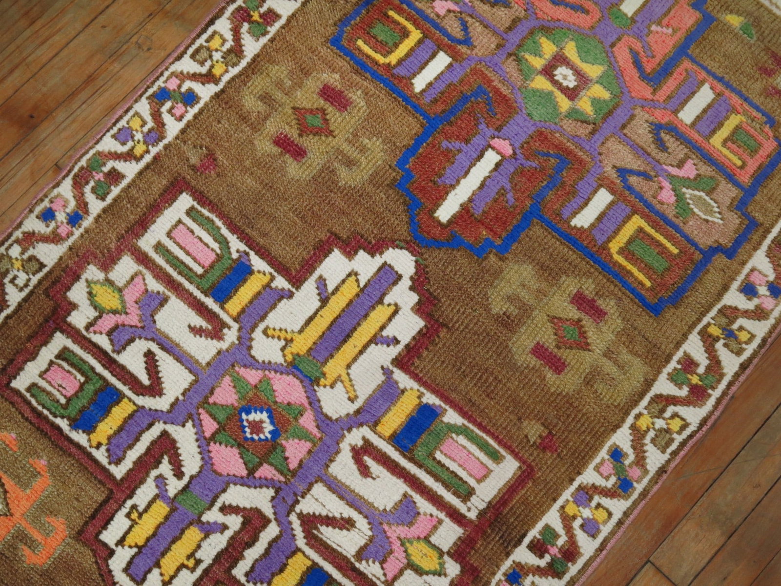 2' 10" x 12' 10" Anatolian Turkish runner brown field rug: 2' 10" x 12' 10" Anatolian Turkish runner brown field rug Mid 20th century Turkish Anatolian runner with a brown field and color pop design. Pre-owned. Specifications Type: Anatolian Category: Runner 