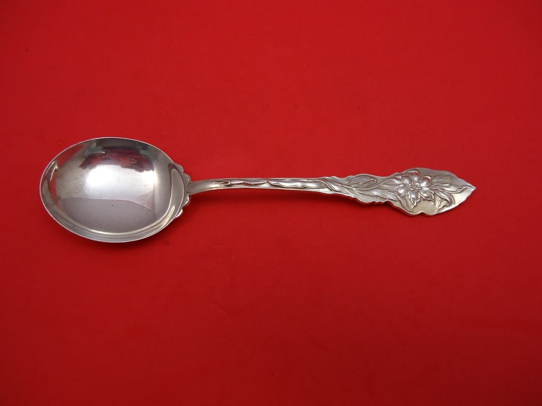 Sterling Silver Cream Soup Spoon Unger Narcissus 5 7/8: Sterling Silver Cream Soup Spoon Unger Narcissus 5 7/8 Sterling silver cream soup spoon in the Narcissus pattern by Unger. It is not monogrammed and is in excellent pre-owned condition. Specifications