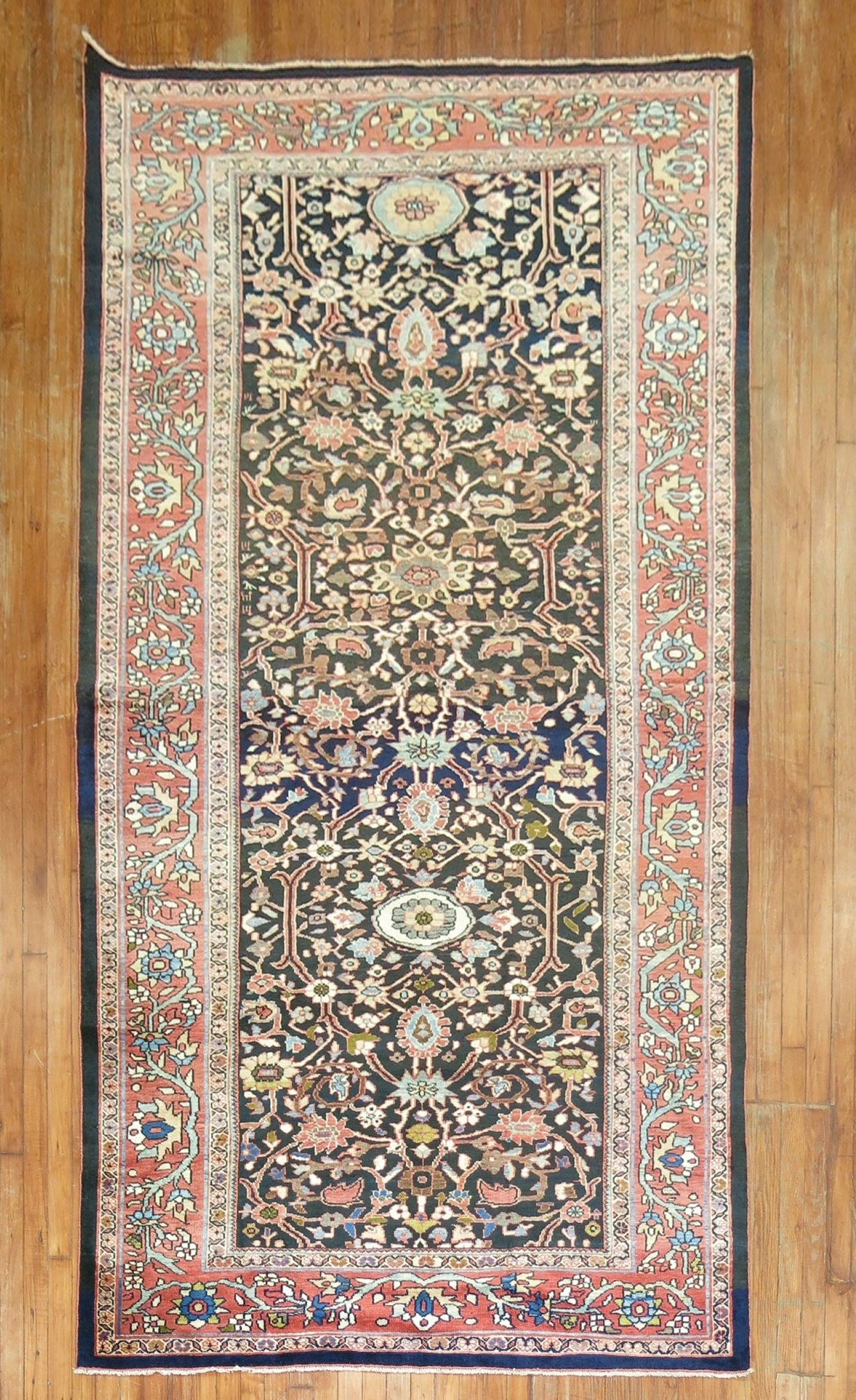 5' 2" x 10' 3" Early 20th Century Sultanabad Mahal Gallery Rug: 5' 2" x 10' 3" Early 20th Century Sultanabad Mahal Gallery Rug An early 20th century Sultanabad/Mahal gallery rug with a long, narrow gallery-size format. This pre-owned antique rug is identified as a