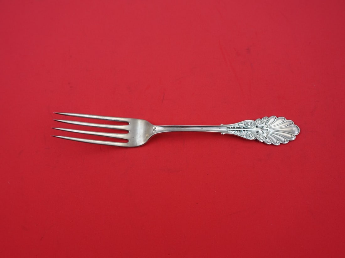 Grecian Sterling Silver Dinner Fork 8 Inch by Wood & Hughes: Grecian Sterling Silver Dinner Fork 8 Inch by Wood & Hughes This exquisite 8-inch dinner fork from the Grecian pattern by Wood and Hughes is composed of high-quality sterling silver. It showcases a cl