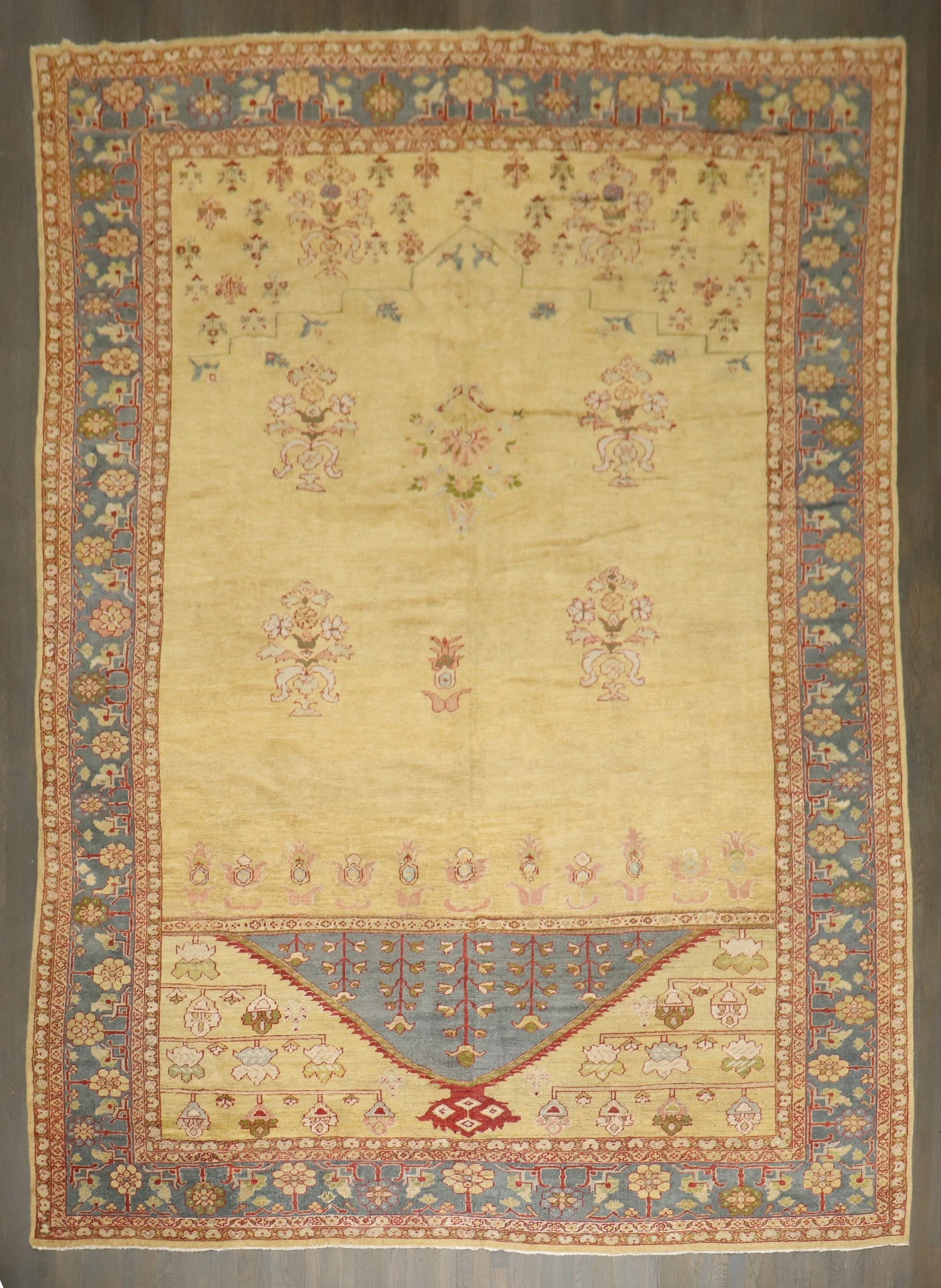 10' x 13' 10" Persian Sultanabad Mahal Carpet Mustard Gold Field: 10' x 13' 10" Persian Sultanabad Mahal Carpet Mustard Gold Field Late 19th century Persian Mahal Sultanabad carpet featuring a mustard and gold field with a directional design. This pre-owned room-siz