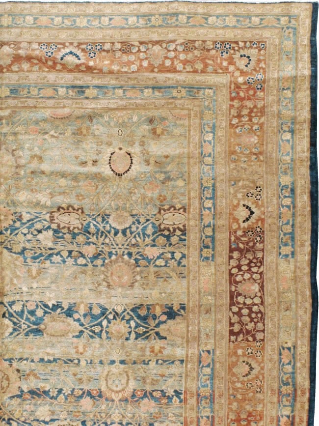 11' 1" x 19' 1" Persian Tabriz Rug Blue Gray Abrashed Ground: 11' 1" x 19' 1" Persian Tabriz Rug Blue Gray Abrashed Ground Early 20th century Persian Tabriz rug with a high-quality weave and a versatile design. The rug features a charming blue gray abrashed grou