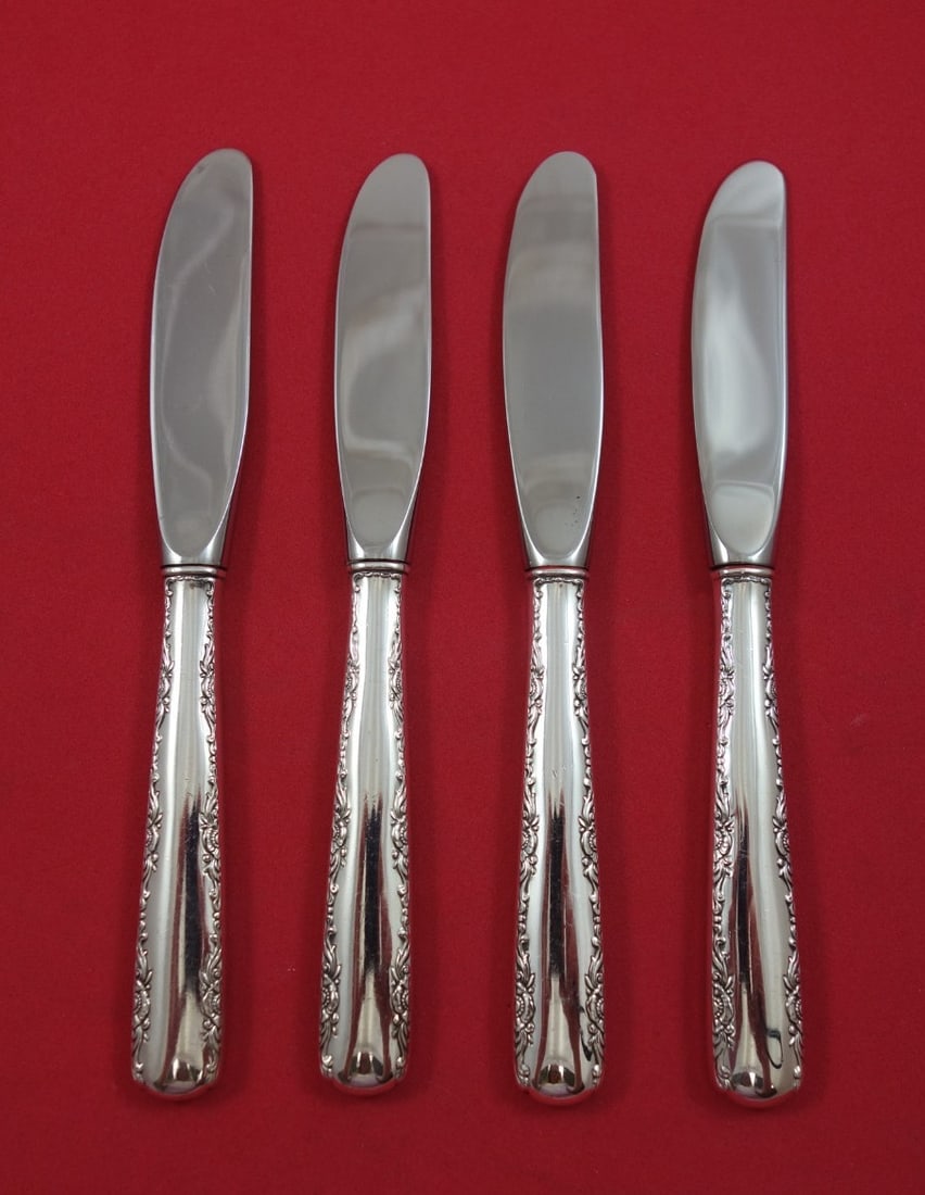 Gorham Camellia Sterling Silver Butter Spreaders Set of 4 6 1 4: Gorham Camellia Sterling Silver Butter Spreaders Set of 4 6 1 4 This set includes four sterling silver hollow handle butter spreaders with modern stainless blades in the Camellia pattern by Gorham. Fe