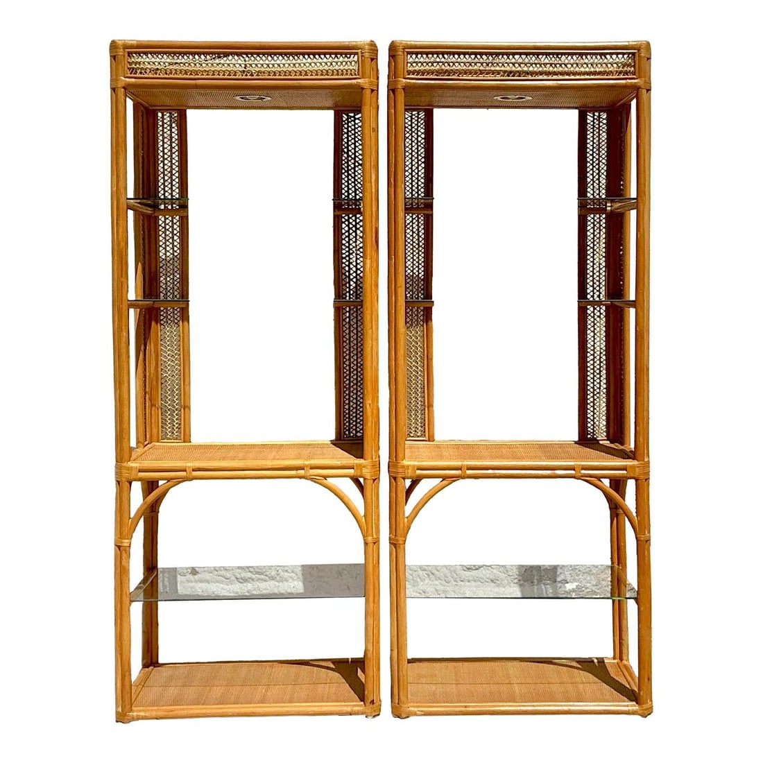 Pair of Vintage Coastal Woven Rattan Etageres 76 inches Tall: Pair of Vintage Coastal Woven Rattan Etageres 76 inches Tall Enhance your living space with this captivating pair of vintage coastal woven rattan etageres. Expertly crafted from durable rattan, each s