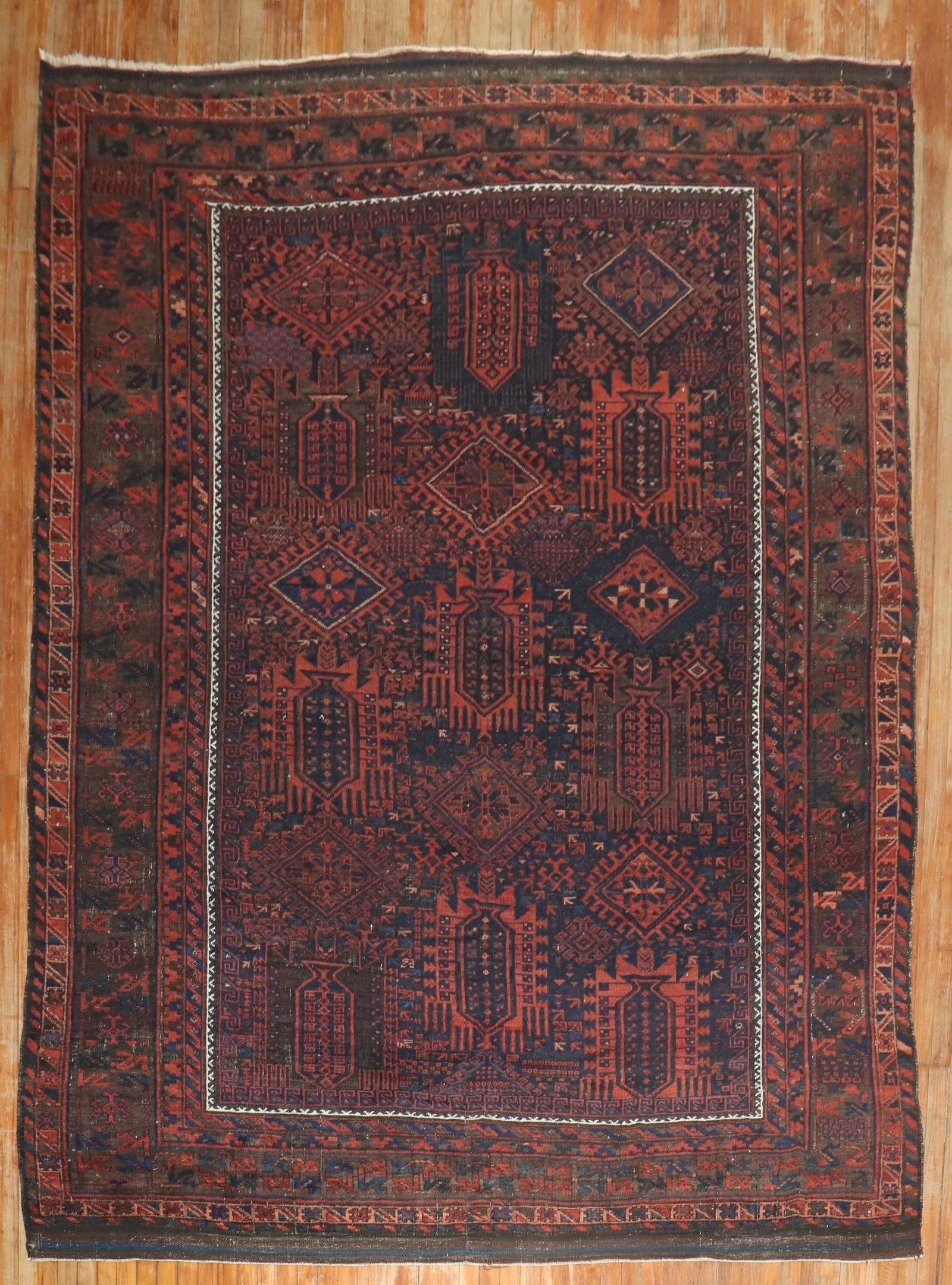 8' 2" x 10' 7" Late 19th Century Balouch Room Rug: 8' 2" x 10' 7" Late 19th Century Balouch Room Rug Rare late 19th century Balouch tribal room size rug with a pre-owned condition. This piece is identified as a Balouch rug and retains its period chara