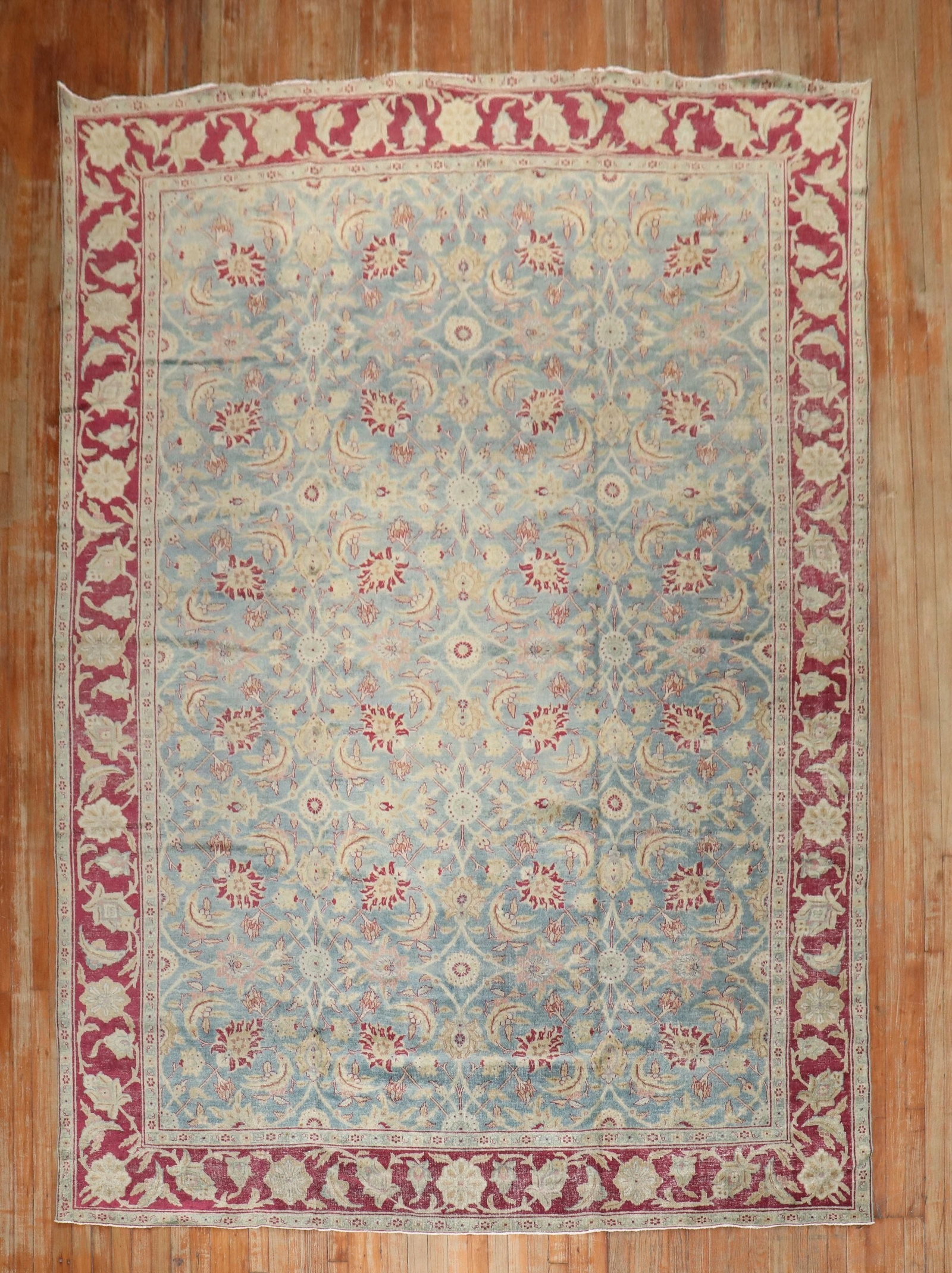 7' 11" x 11' 6" Persian Tabriz room size rug: 7' 11" x 11' 6" Persian Tabriz room size rug Early 20th century Persian Tabriz room size rug. This pre-owned rectangular rug features a floral pattern with a predominantly blue field and red border, c